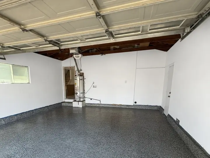 Gray flake epoxy garage floor finished wall to wall in San Jose, CA