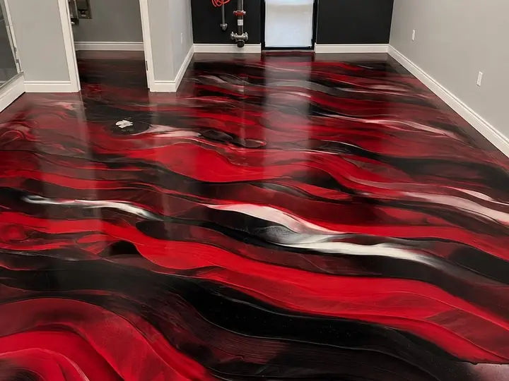 Red and black metallic epoxy floor running through a hallway in San Jose, CA